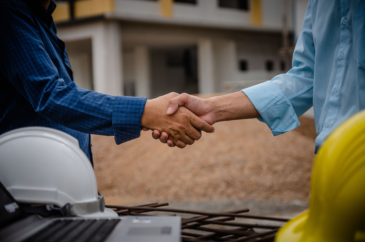 Handshake Home Inspector with Construction Experience